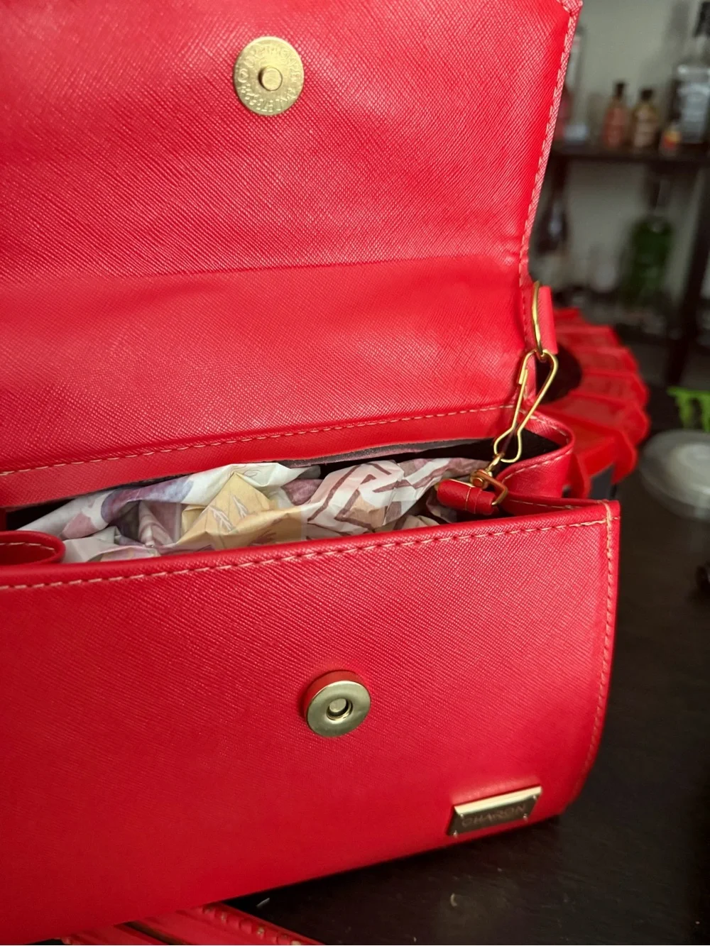 Quilted Red Crossbody Bag with Braided Handle and Tassel